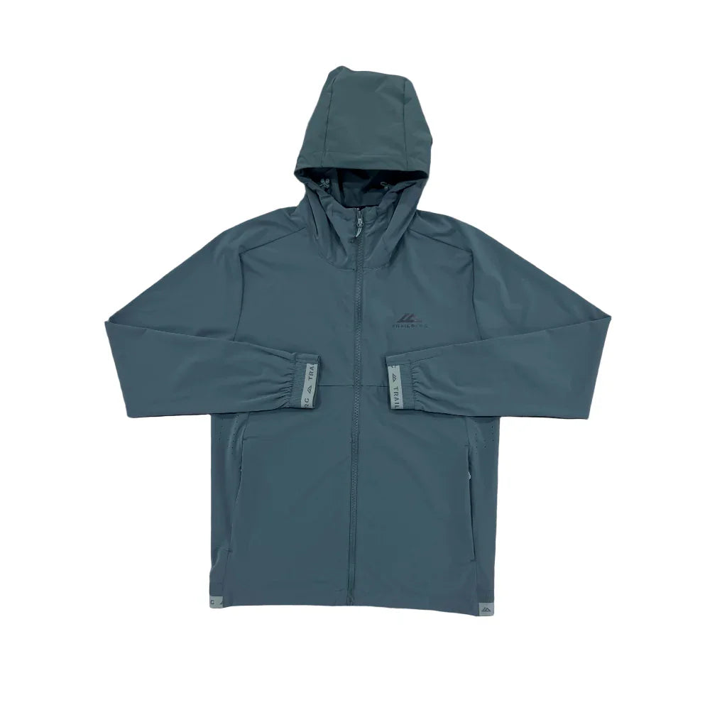 Blue jacket on a textured gray surface